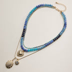 Layered Beaded and Pendant Necklace Set with Gold Accents | Heart and Charm Detail