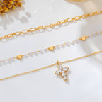 Multi-Strand Pearl & Crystal Cross Necklace | 80N93302