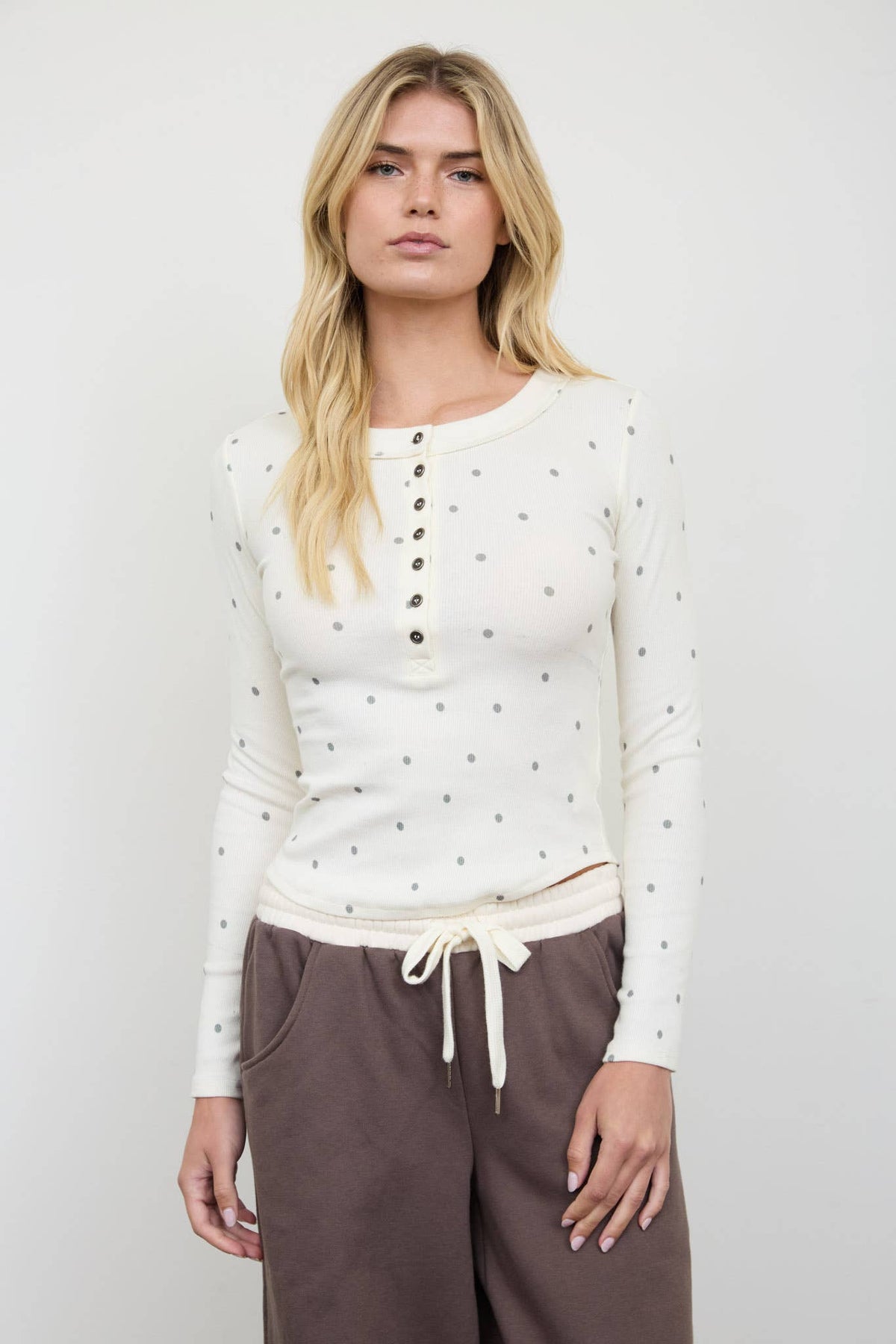 POLKA DOT LONG SLEEVE HENLEY KNIT TOP