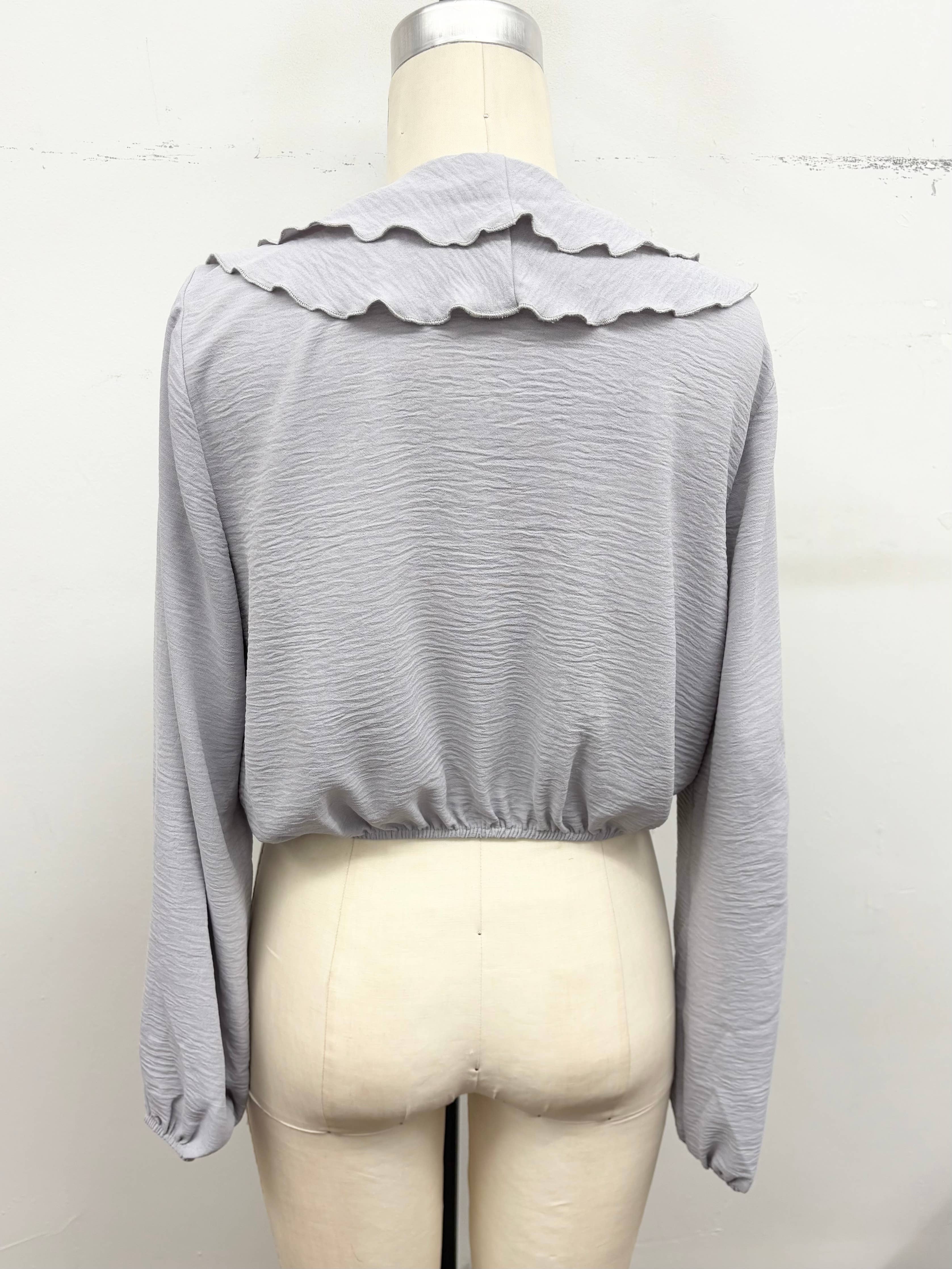 Ruffle Cascade V-Neck Blouse