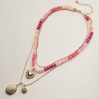 Layered Beaded and Pendant Necklace Set with Gold Accents | Heart and Charm Detail
