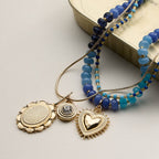 Layered Beaded and Pendant Necklace Set with Gold Accents | Heart and Charm Detail