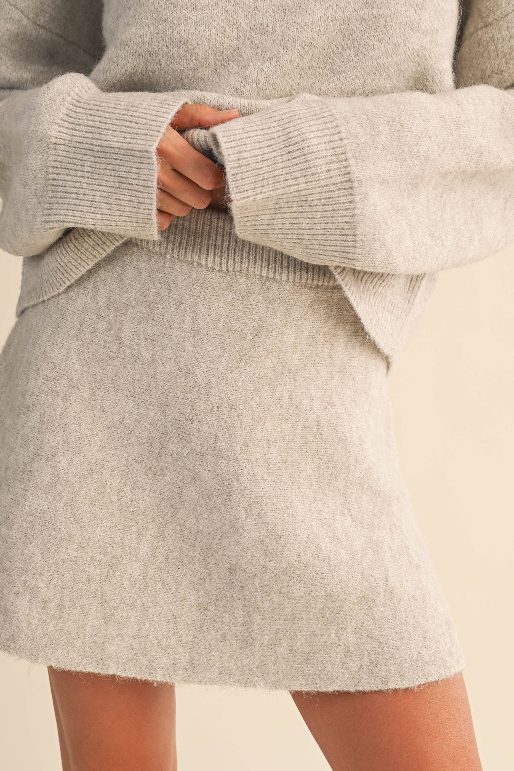 LONG SLEEVE SWEATER TOP AND FLARED MINI SKIRT SET