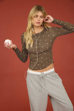 POLKA DOT LONG SLEEVE HENLEY KNIT TOP