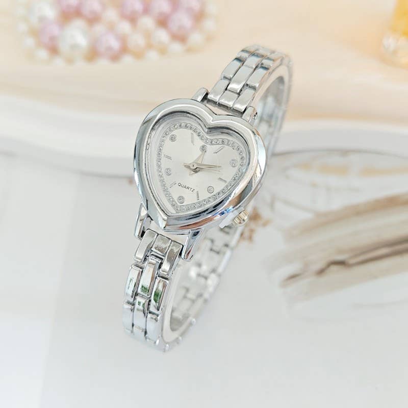 HEART DIAL OVAL BAND BRACELET WATCH | 40W3000