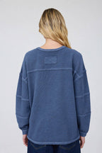 EXPOSED SEAM DETAIL LONG SLEEVE KNIT TOP