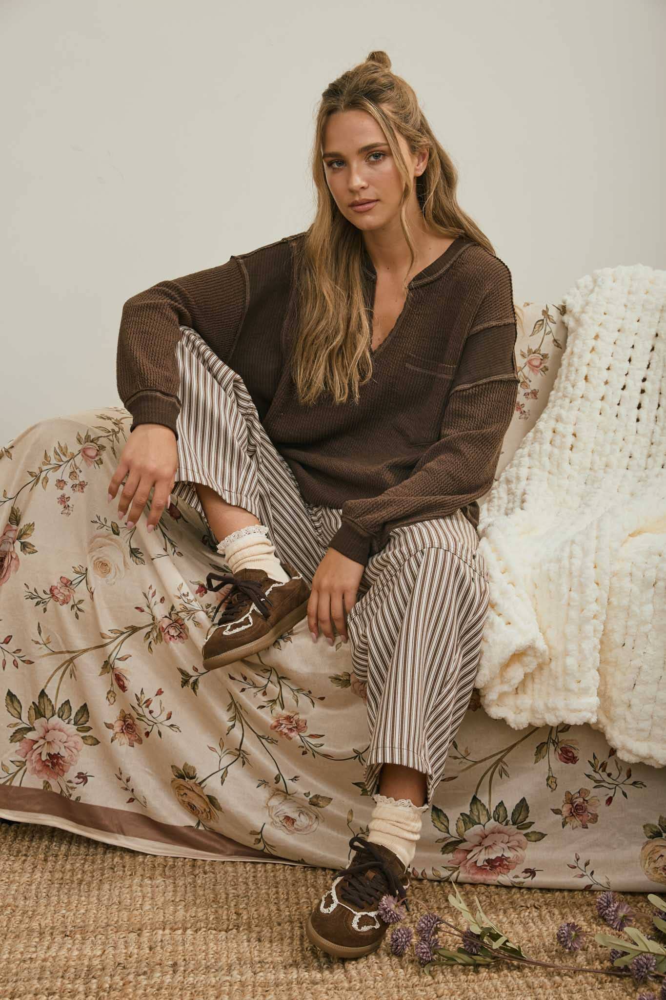 SPLIT NECK RAW EDGE LONG SLEEVE RIBBED KNIT TOP