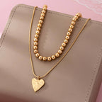 DOUBLE LAYER BALL CHAIN HEART CHARM NECKLACE | 80N92736