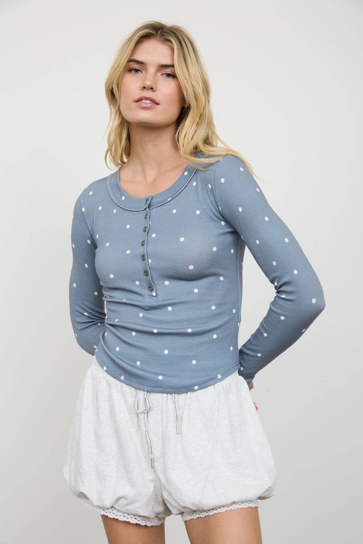 POLKA DOT LONG SLEEVE HENLEY KNIT TOP