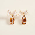 Bow Accent Football Drop Dangle Earrings
