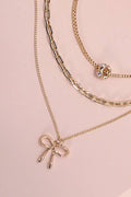 MULTI LAYER PEARL BOW CAHRM NECKLACE | 80N605