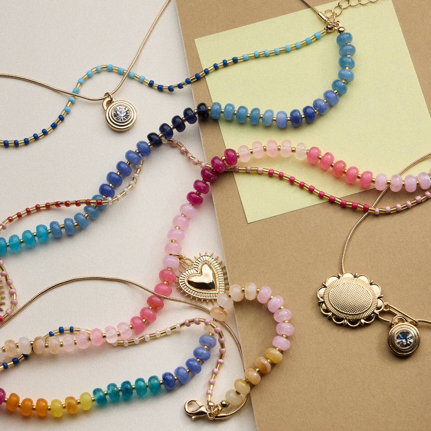 Layered Beaded and Pendant Necklace Set with Gold Accents | Heart and Charm Detail
