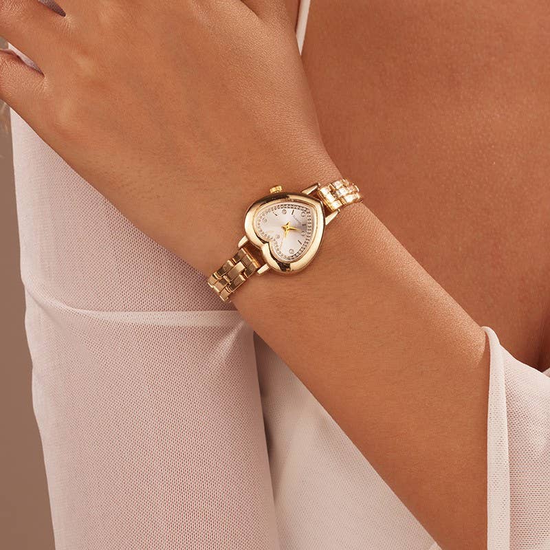 HEART DIAL OVAL BAND BRACELET WATCH | 40W3000