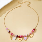 Pink Beaded Heart and Shell Charm Necklace | 80N92903