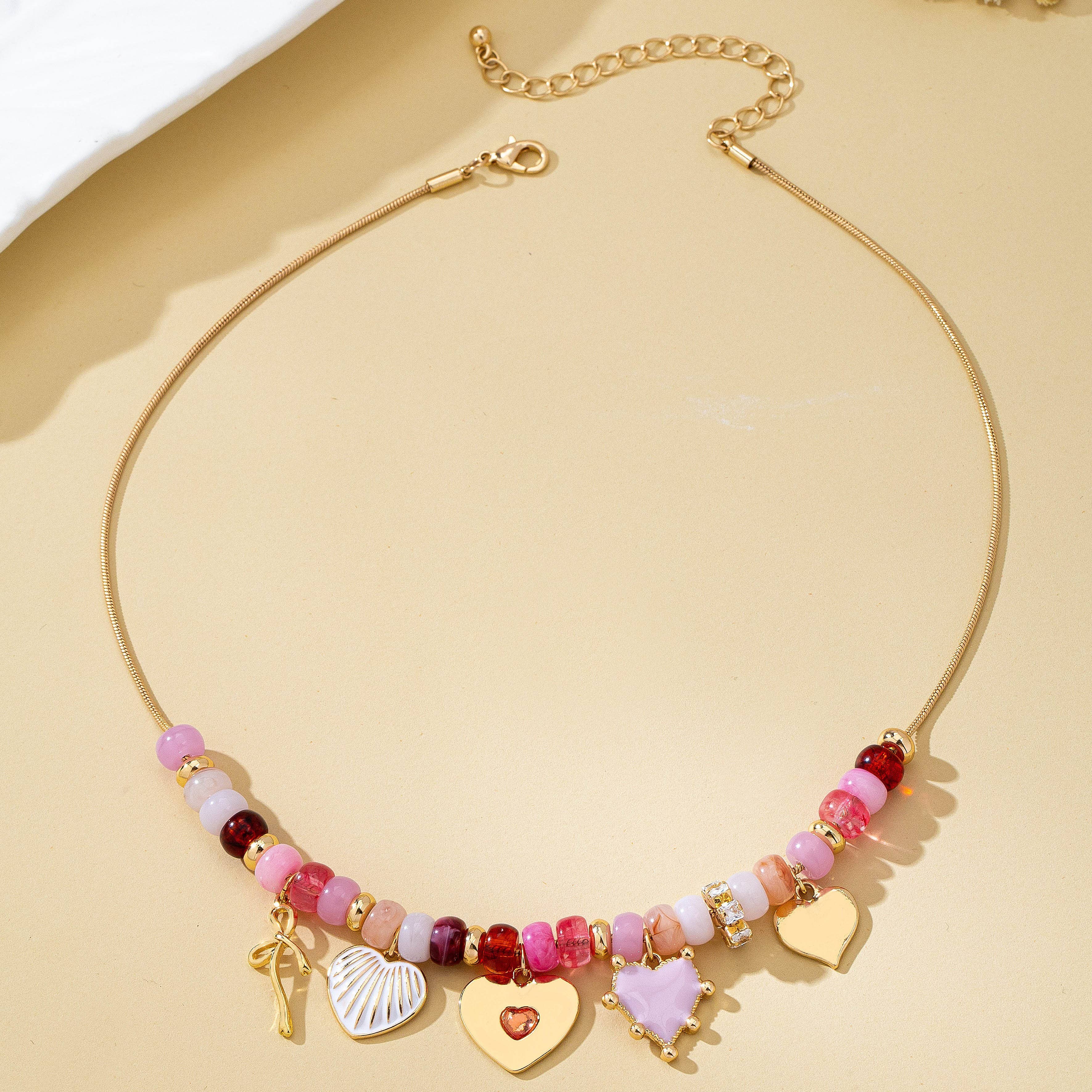 Pink Beaded Heart and Shell Charm Necklace | 80N92903