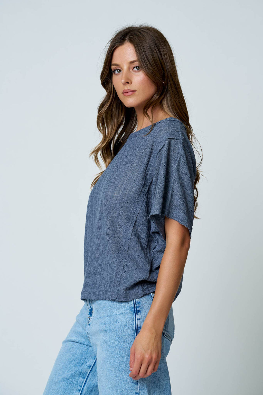 DOLMAN SHORT SLEEVE EXPOSED SEAM TEXTURED KNIT TOP