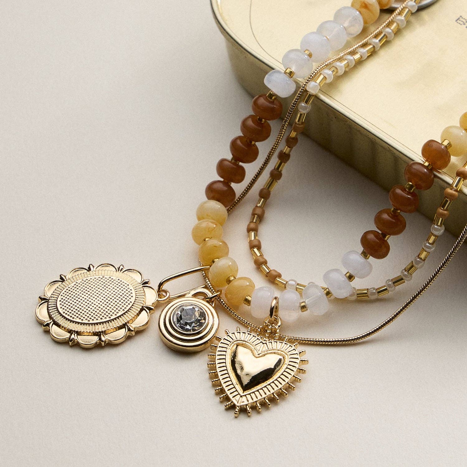 Layered Beaded and Pendant Necklace Set with Gold Accents | Heart and Charm Detail