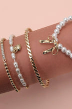 BOW PEARL RHINESTONE BAR STRETCH BANGLE SET