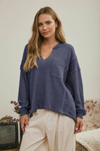 SPLIT NECK RAW EDGE LONG SLEEVE RIBBED KNIT TOP