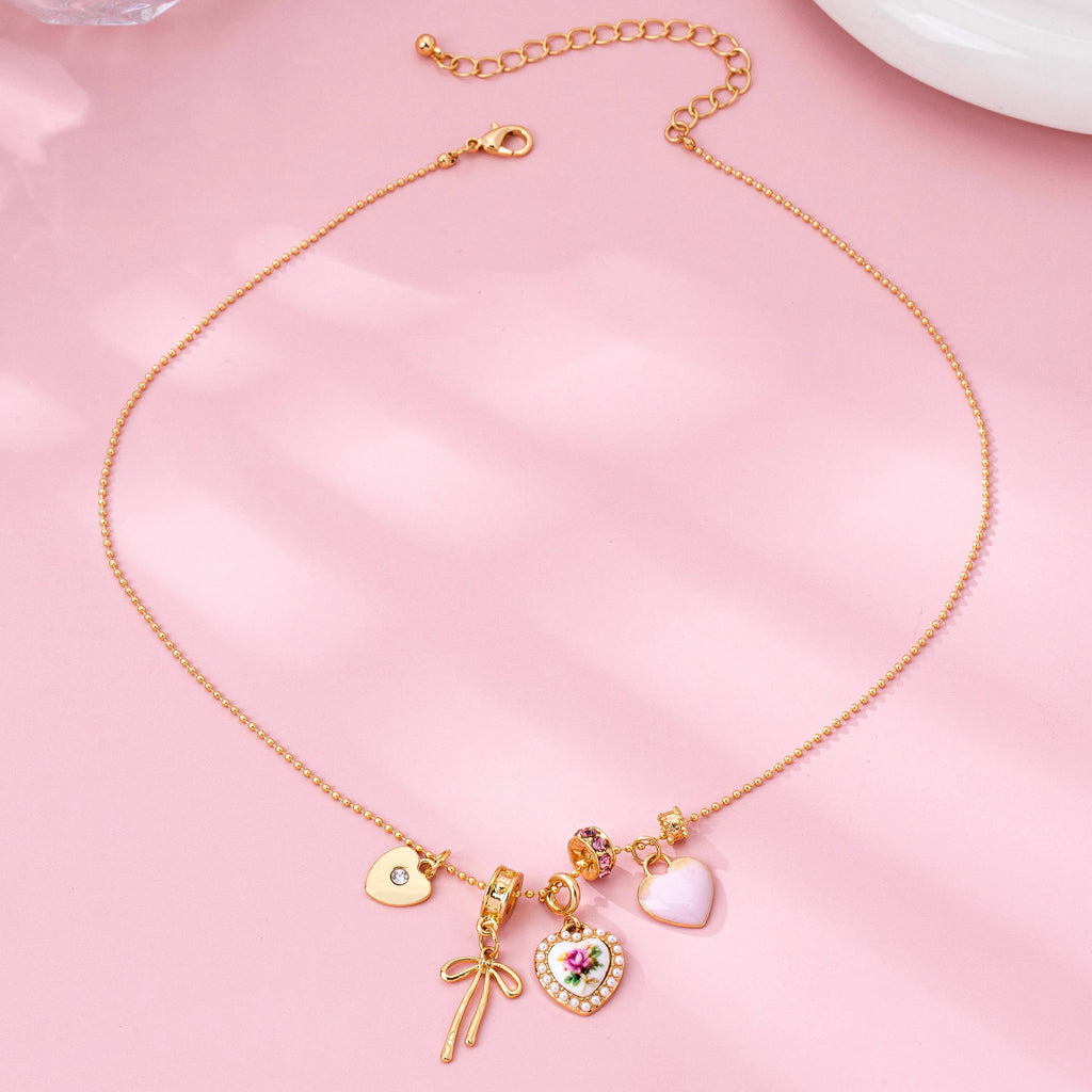 Multi Charm Porcelain Bow Ball Chain Necklace | 80N92892