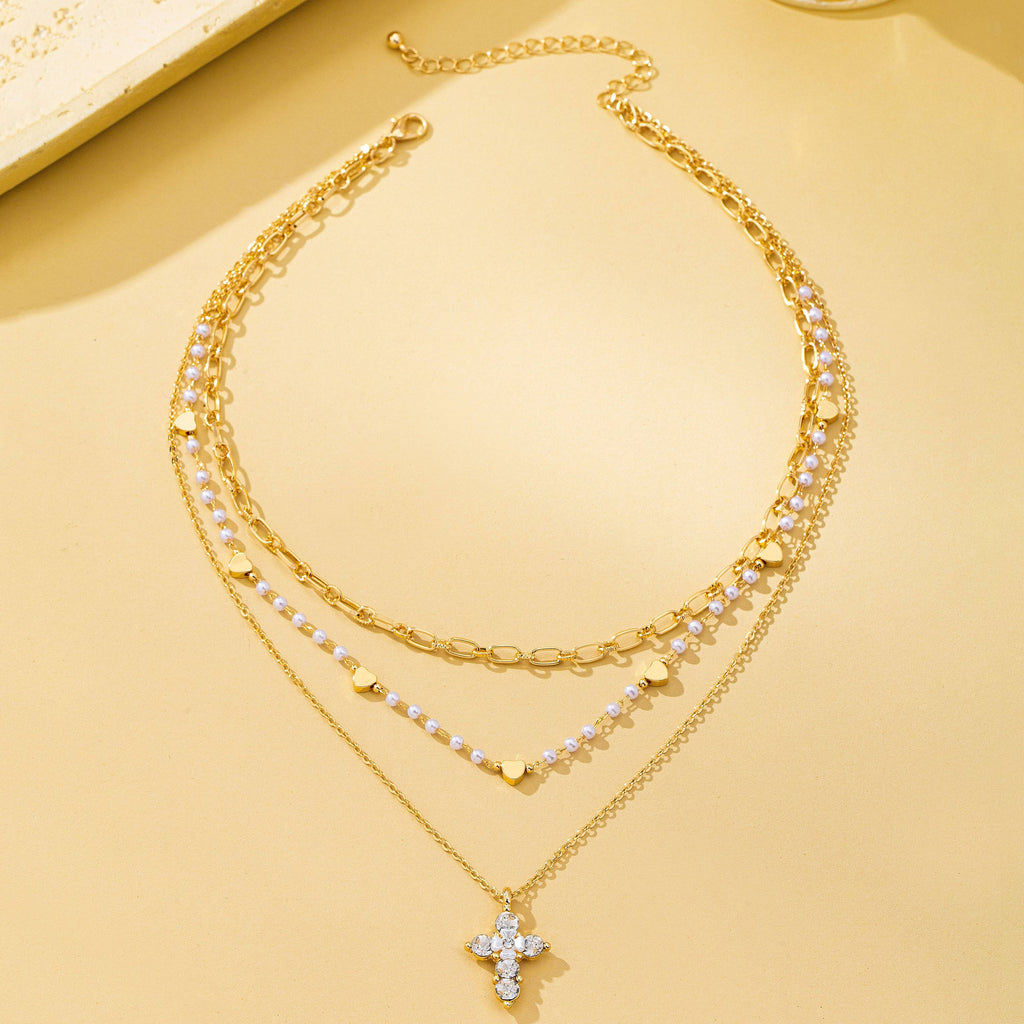 Multi-Strand Pearl & Crystal Cross Necklace | 80N93302