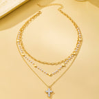 Multi-Strand Pearl & Crystal Cross Necklace | 80N93302