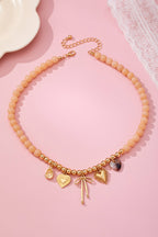 Beige Beaded Bow Heart Rhinestone Charm Necklace | 80N92689