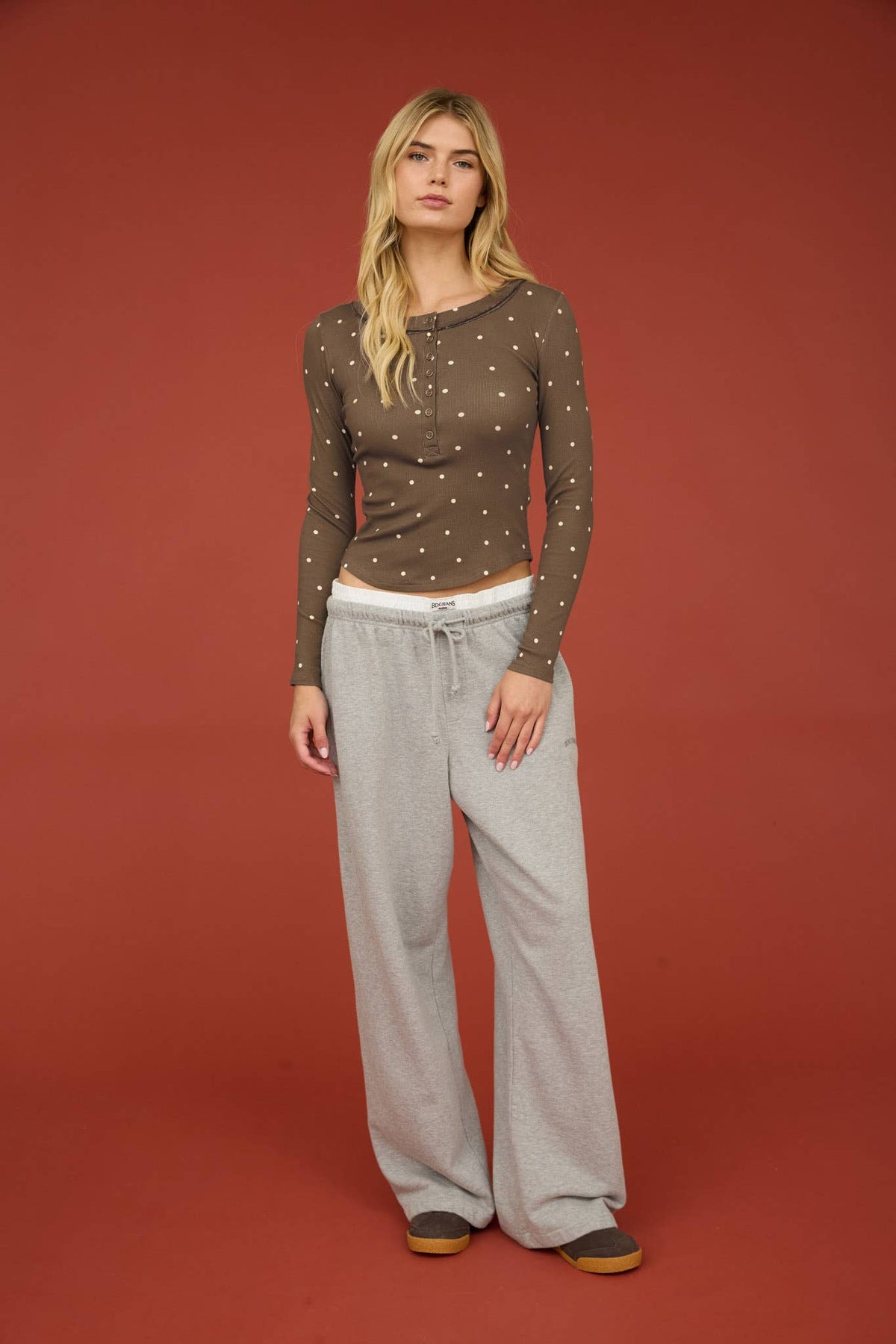 POLKA DOT LONG SLEEVE HENLEY KNIT TOP