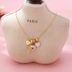 Multi Charm Porcelain Bow Ball Chain Necklace | 80N92892