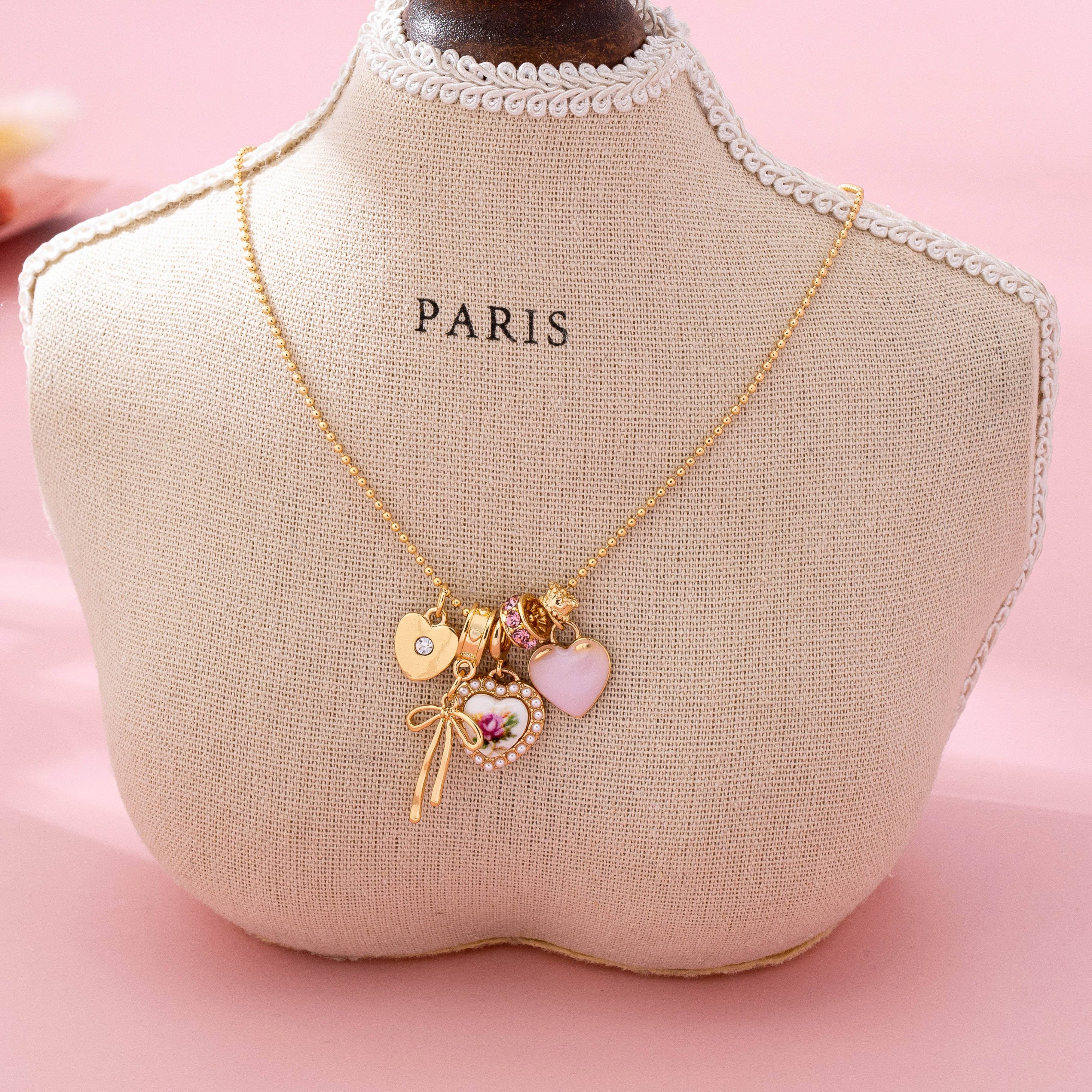 Multi Charm Porcelain Bow Ball Chain Necklace | 80N92892