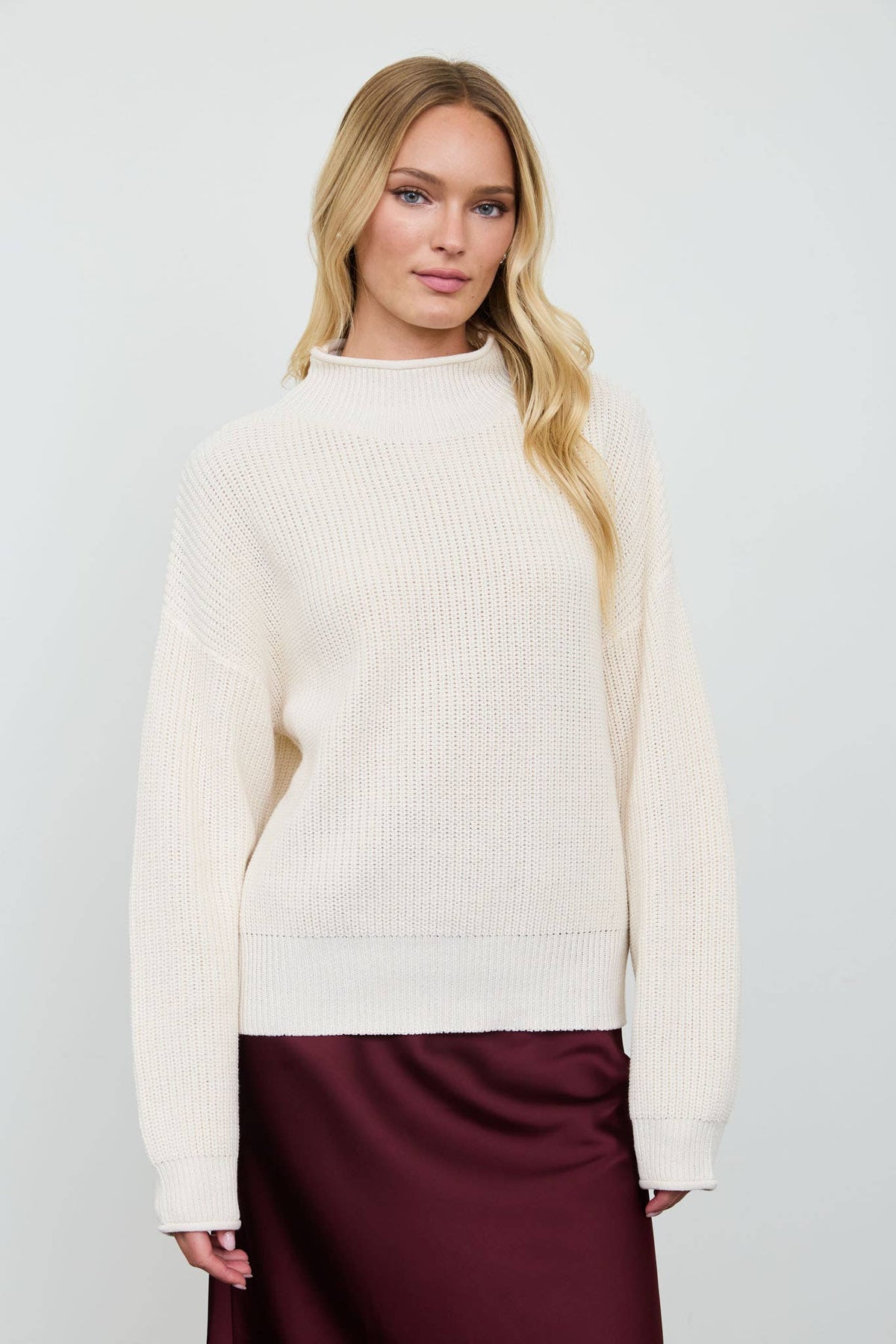 RIBBED ROLLED MOCK NECK CROPPED KNIT SWEATER