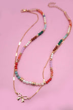 MULTI BEADED BOW CHARM DOUBLE LAYER NECKLACE | 80N91498