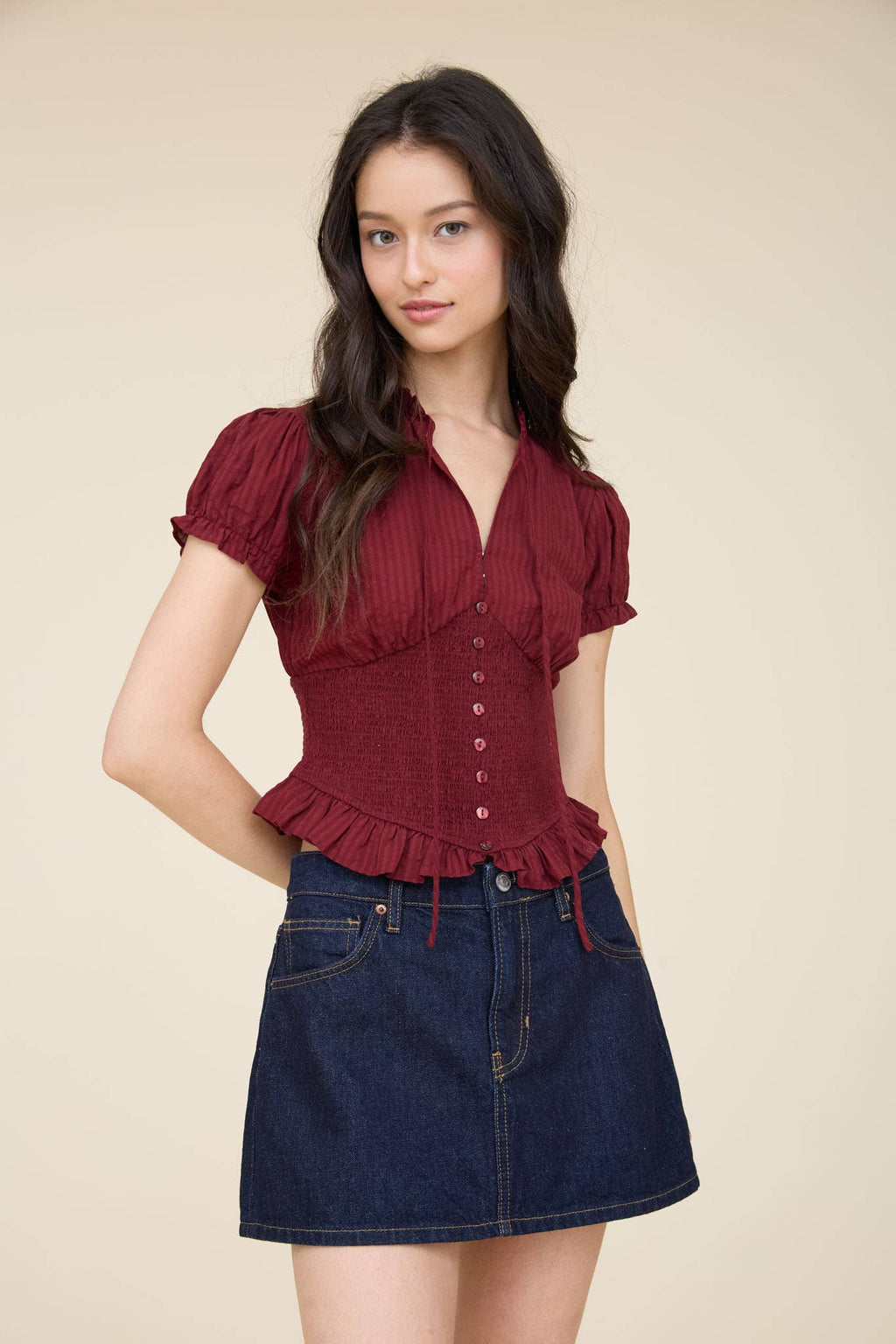 SMOCKED PEPLUM TIE NECK RUFFLED TOP