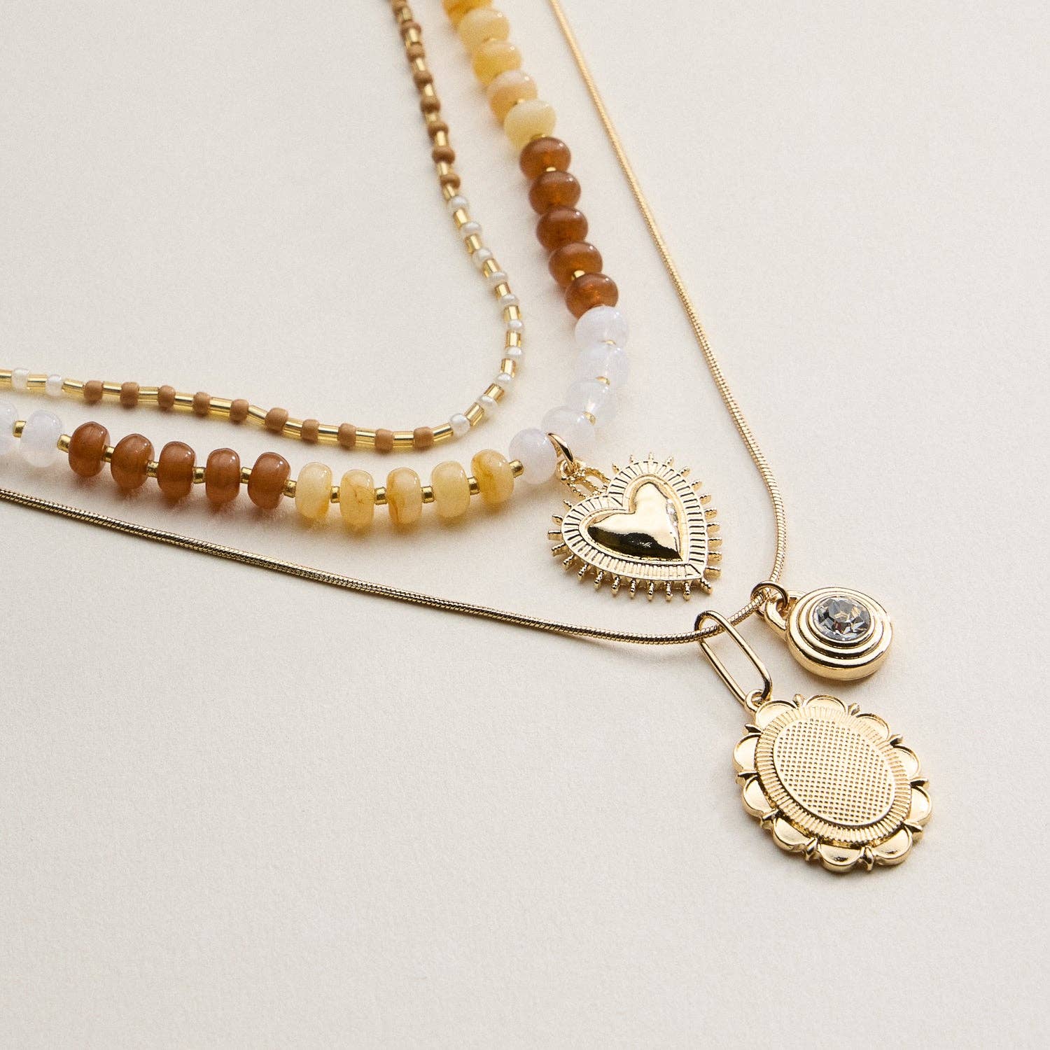 Layered Beaded and Pendant Necklace Set with Gold Accents | Heart and Charm Detail