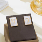 Vintage Enamel & Gold Bow Stud Earrings | 80E62447