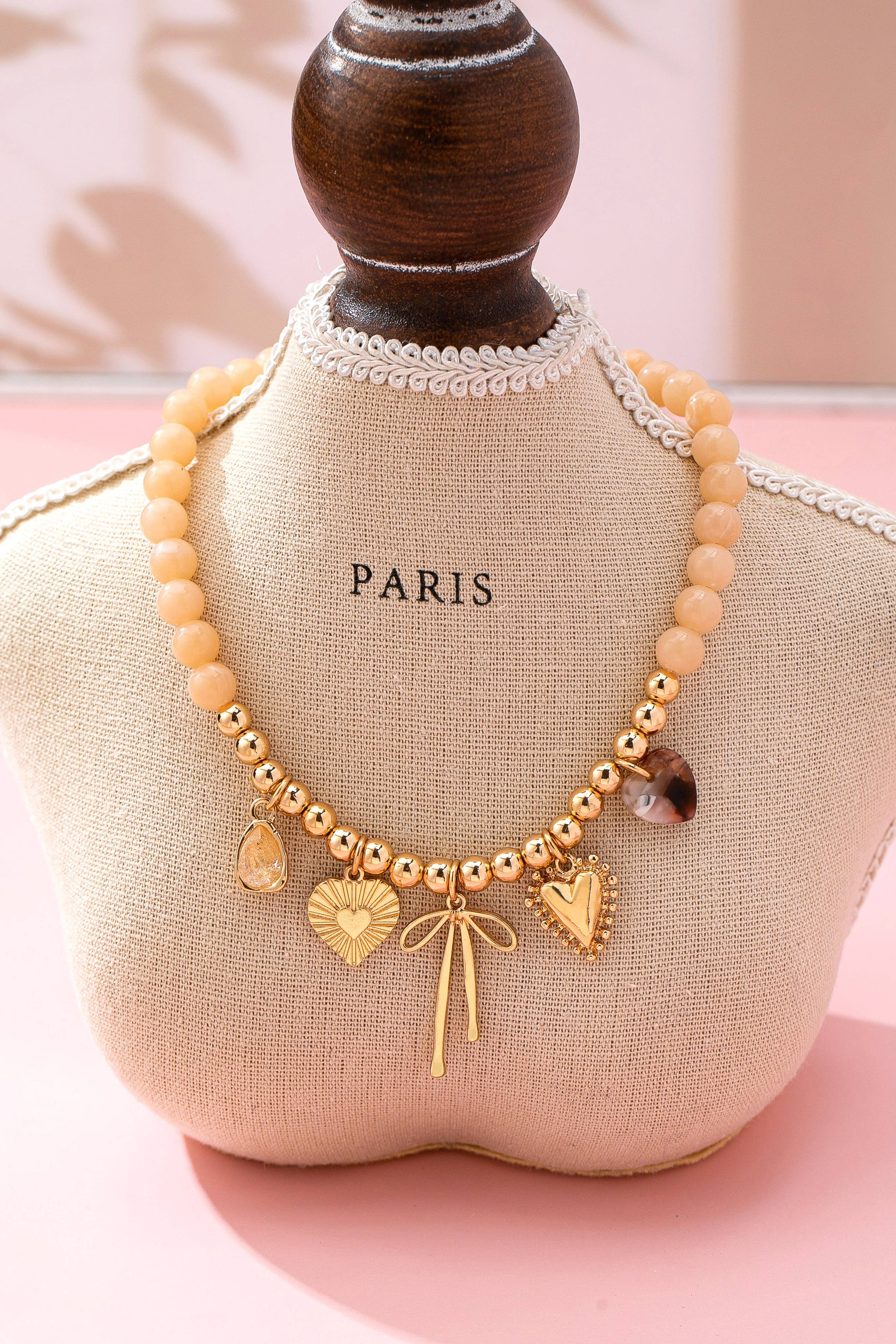 Beige Beaded Bow Heart Rhinestone Charm Necklace | 80N92689