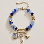 Vibrant Beaded Bracelet | Gold-Tone Trio Charms