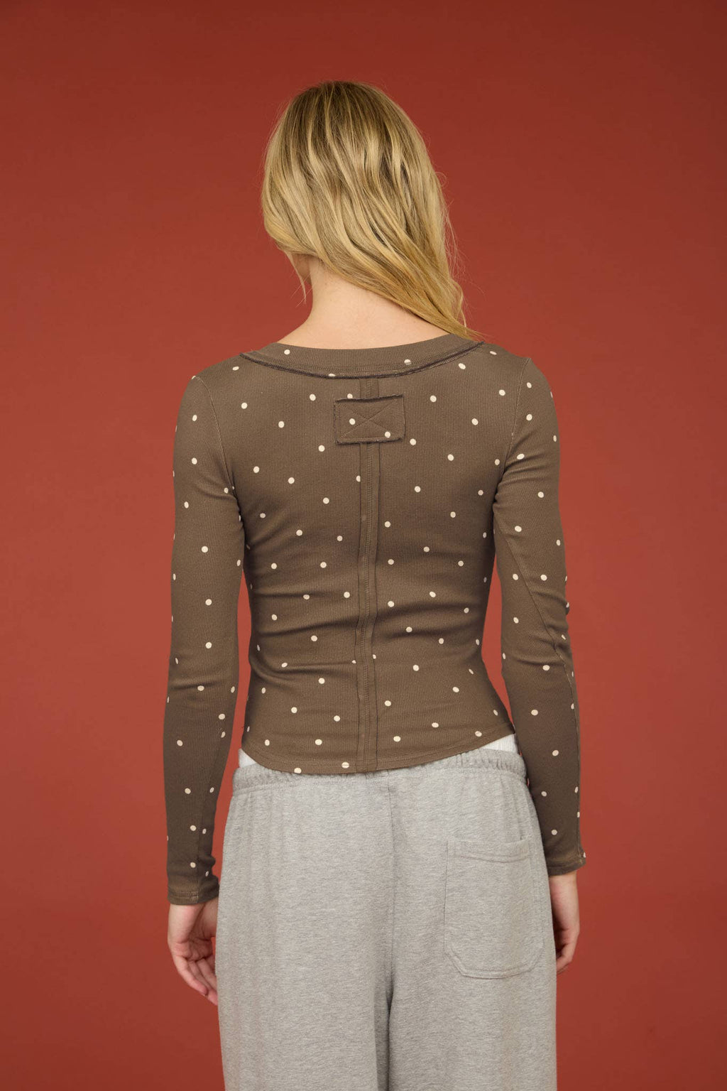 POLKA DOT LONG SLEEVE HENLEY KNIT TOP