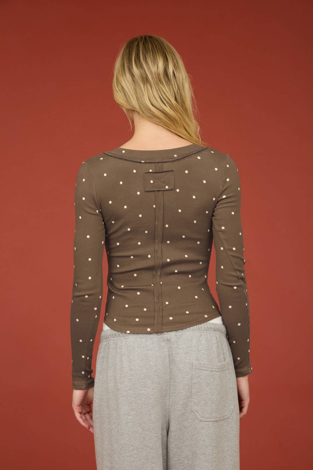 POLKA DOT LONG SLEEVE HENLEY KNIT TOP