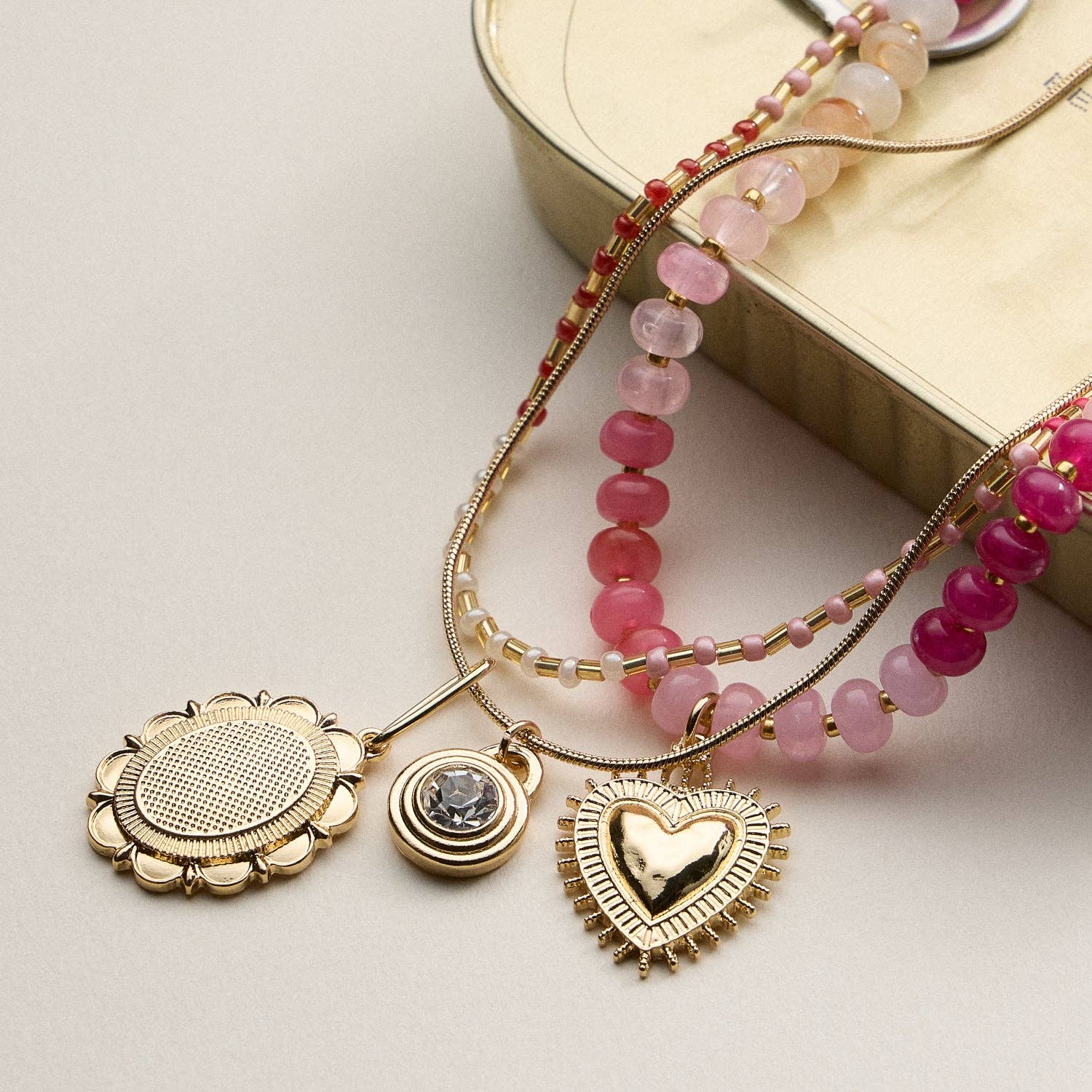 Layered Beaded and Pendant Necklace Set with Gold Accents | Heart and Charm Detail