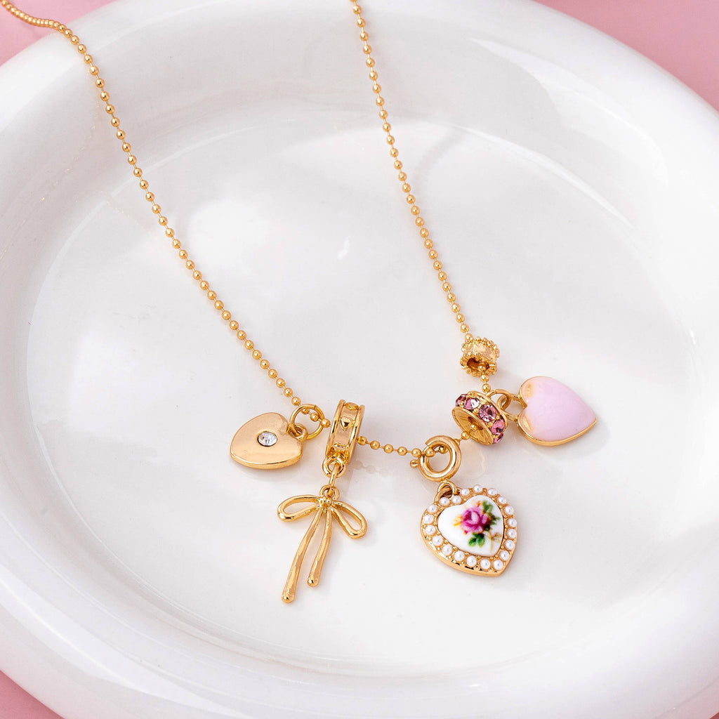 Multi Charm Porcelain Bow Ball Chain Necklace | 80N92892