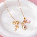 Multi Charm Porcelain Bow Ball Chain Necklace | 80N92892
