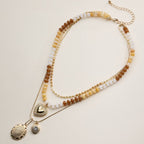 Layered Beaded and Pendant Necklace Set with Gold Accents | Heart and Charm Detail