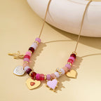 Pink Beaded Heart and Shell Charm Necklace | 80N92903