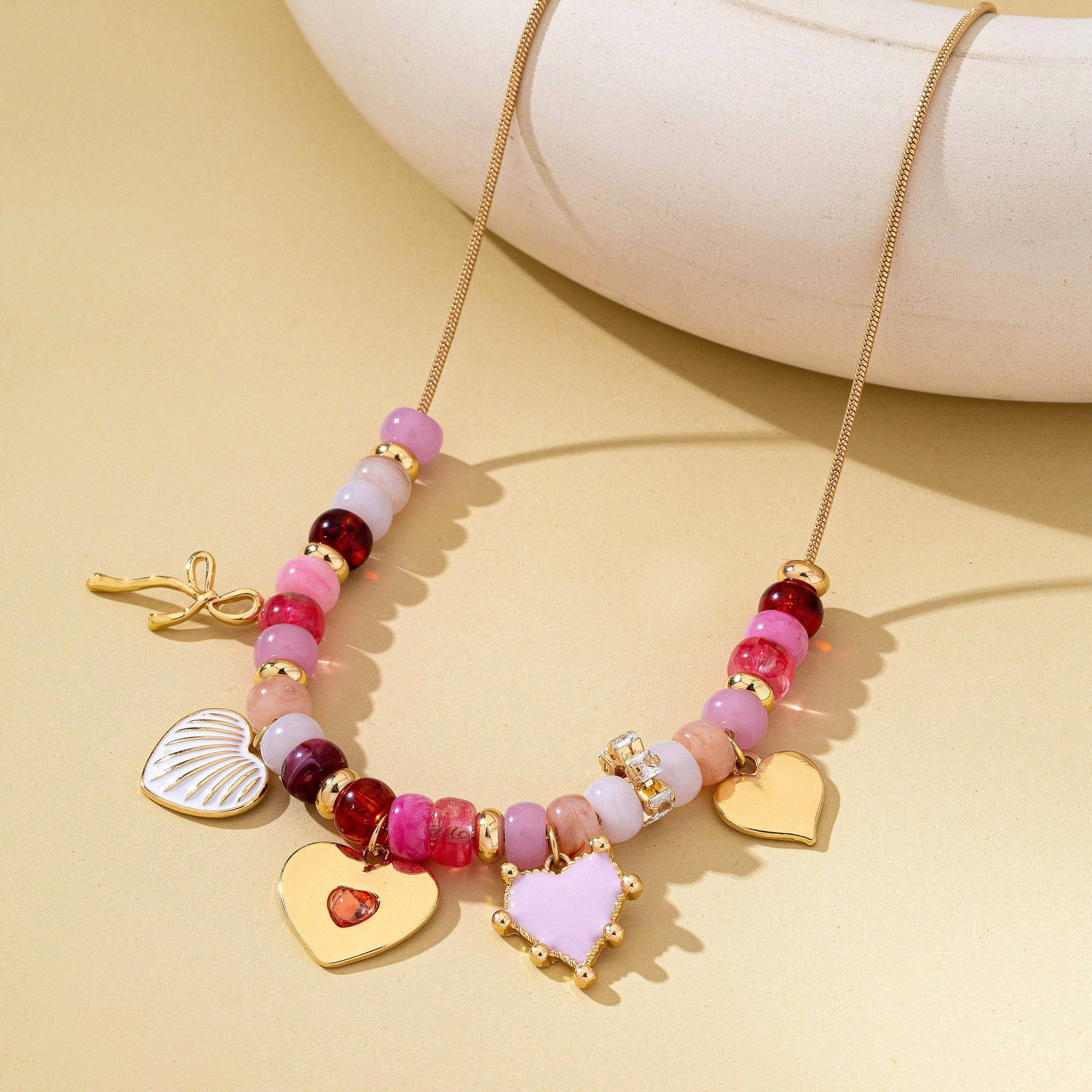 Pink Beaded Heart and Shell Charm Necklace | 80N92903