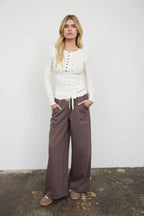 POLKA DOT LONG SLEEVE HENLEY KNIT TOP
