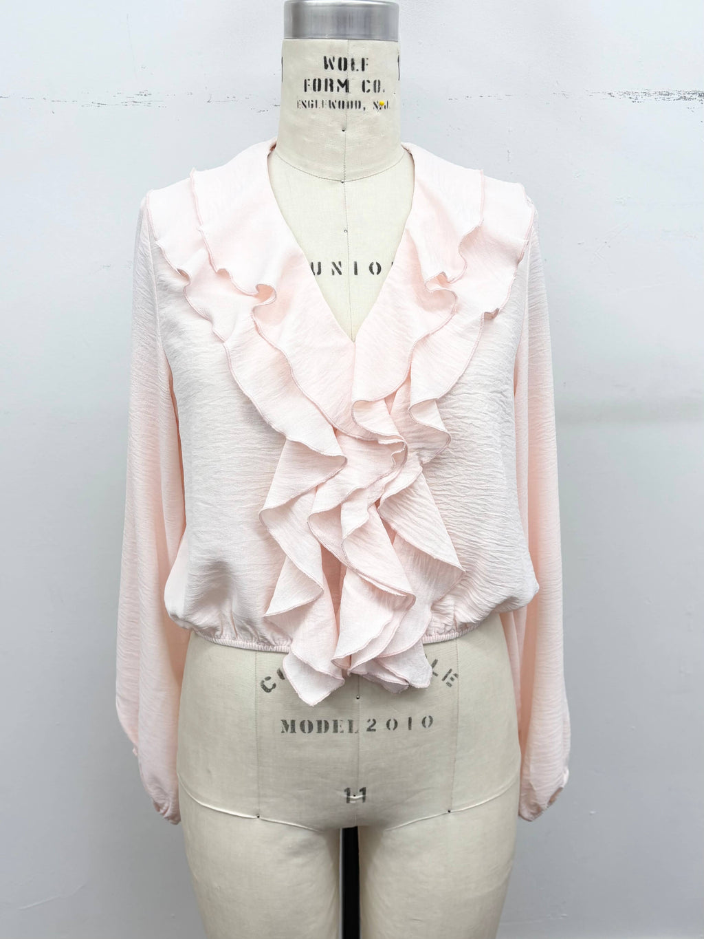 Ruffle Cascade V-Neck Blouse