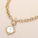 Vintage-Inspired Metal Cross Embossed Medallion Pendant Toggle Necklace