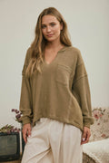 SPLIT NECK RAW EDGE LONG SLEEVE RIBBED KNIT TOP