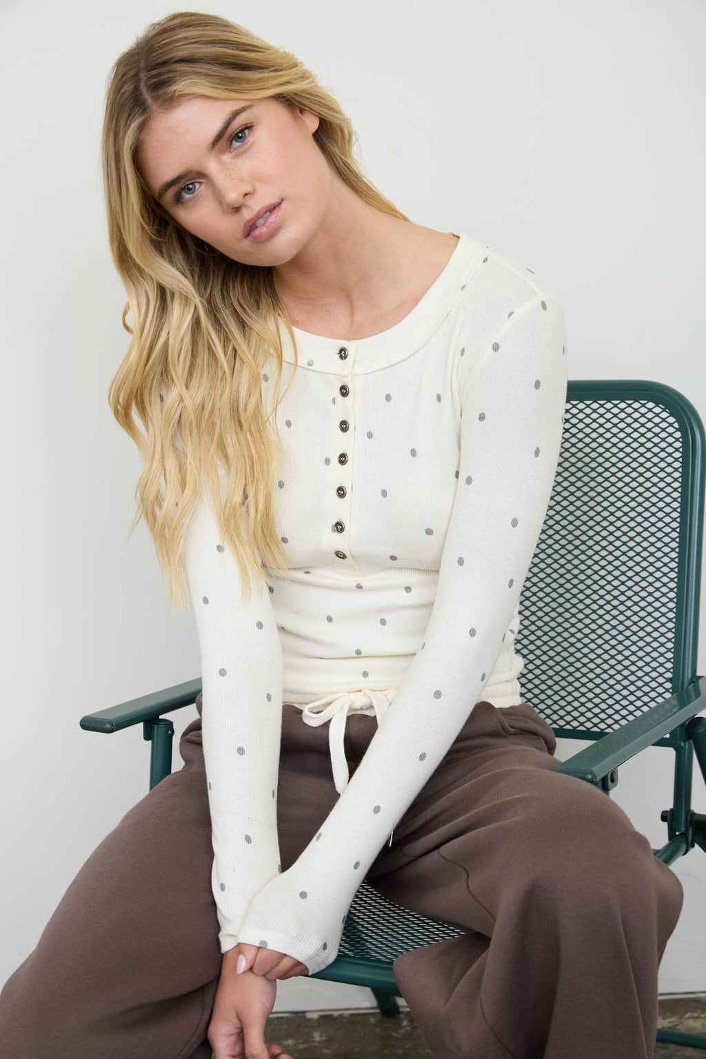 POLKA DOT LONG SLEEVE HENLEY KNIT TOP